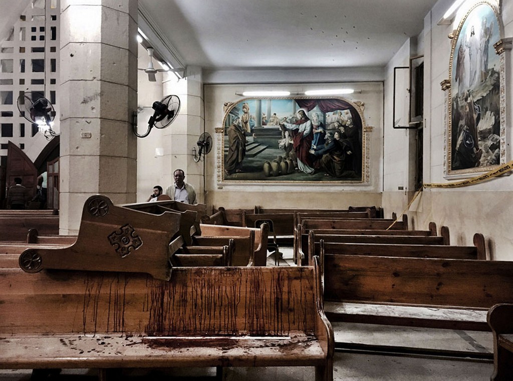 2017_06_09_bloodstains_remain_on_pews_inside_st_george_church_after_a_suicide_bombing_in_the_nile_delta_town_of_tanta_egypt_over_40_killed.jpg