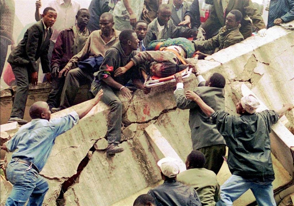 1998_augusztus_rescue_workers_hoist_a_woman_rescued_from_the_u_s_embassy_in_nairobi_august_1998_224_were_killed_in_coordinated_bombings_in_kenya_and_tanzania.jpg