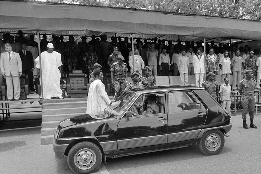 1985_burkina_faso_president_thomas_sankara_in_front_of_his_renault_5_during_an_official_ceremony_for_the_second_anniversary_of_burkina_faso_s_revolution_replace_the_official_fleet_of_mercedes_cheaper_r5_ouagadougou.jpg