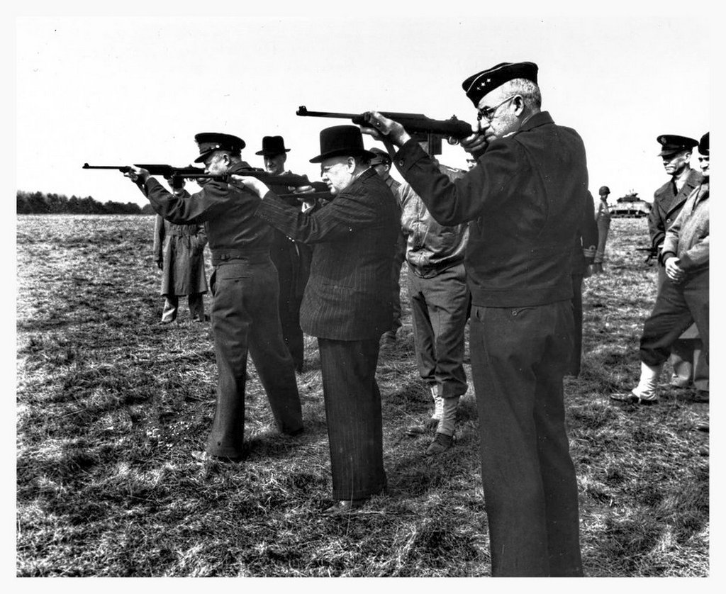 1944_eisenhower_churchill_and_bradley_fire_the_new_m1_carbine_in_england.jpg