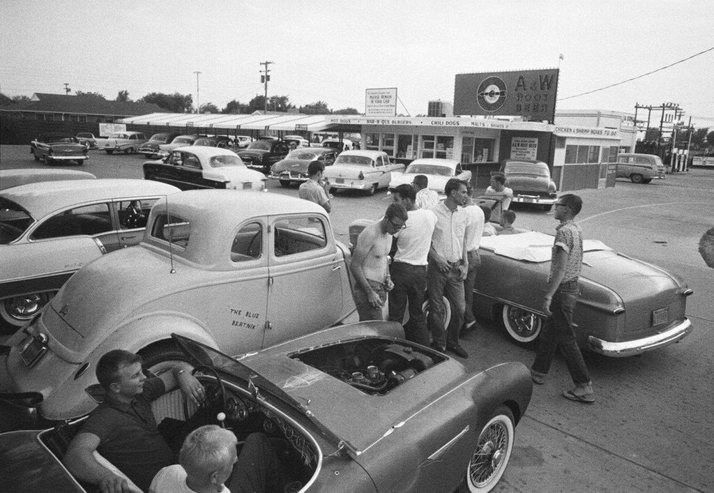 1959_teenagers_in_the_parking_lot_of_an_a_w_drive-in_hutchinson_kansas.jpg