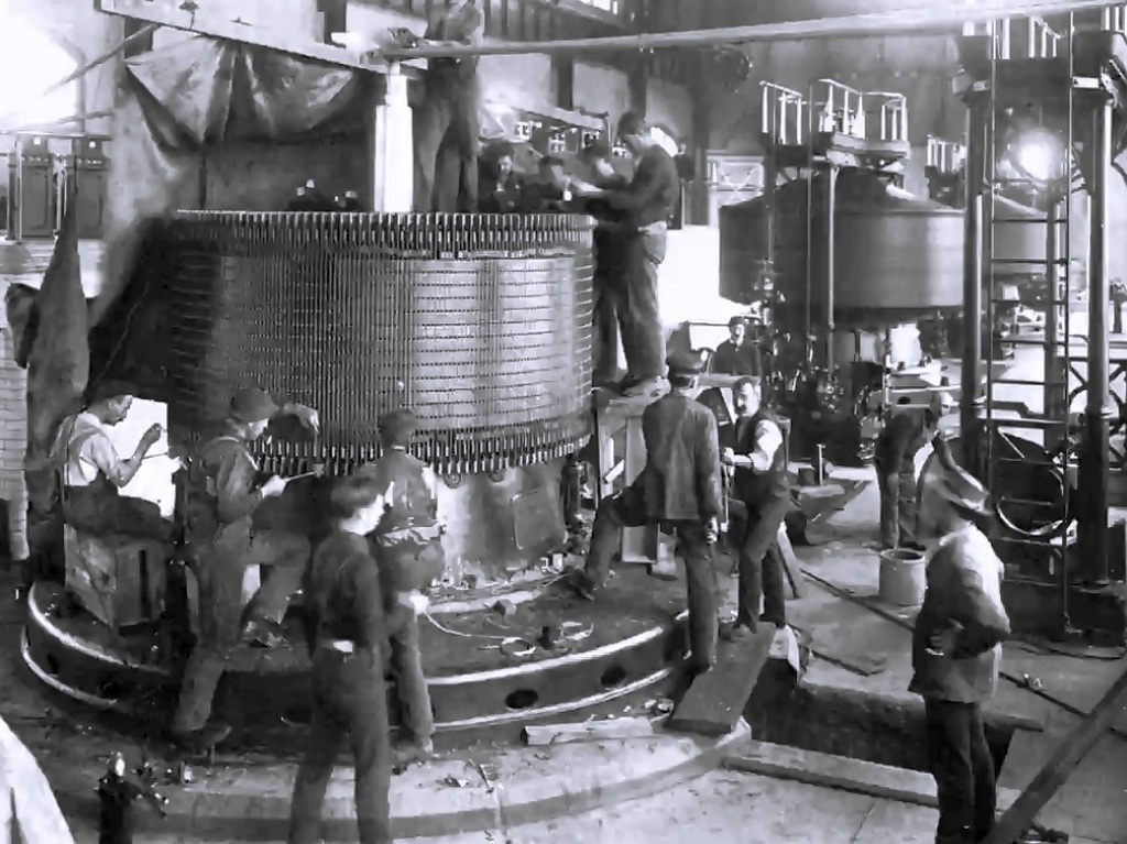1895_installing_a_generator_at_the_adams_power_plant_transformer_house_in_niagara_falls_new_york.jpg