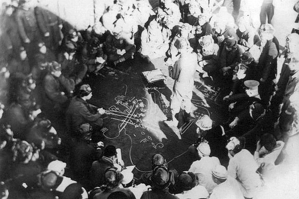 1941_december_6_japanese_navy_lieutenant_ichiro_kitajima_briefs_his_nakajima_b5n2_kate_crews_aboard_the_aircraft_carrier_kaga_about_the_plan_for_the_attack_on_pearl_harbor.jpg