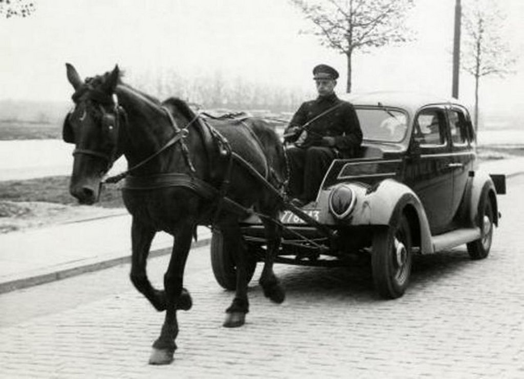 1941_during_the_german_occupation_of_the_netherlands_people_still_used_a_car_without_fuel_because_of_shortages_in_this_picture_a_ford_v_is_drawn_by_a_horse.jpg