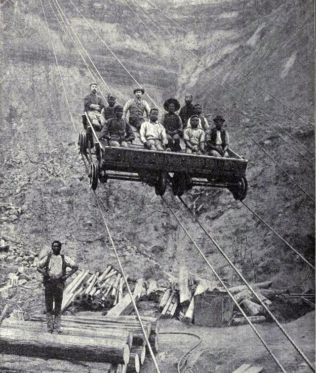 1885_miners_using_an_aerial_tram_to_descend_into_the_kimberly_diamond_mine_in_south_africa.jpg