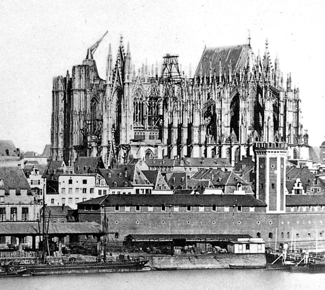 1856_the_unfinished_cologne_cathedral_including_the_enormous_medieval_crane_which_had_topped_the_south_tower_since_construction_stopped_in_the_1400s.jpg