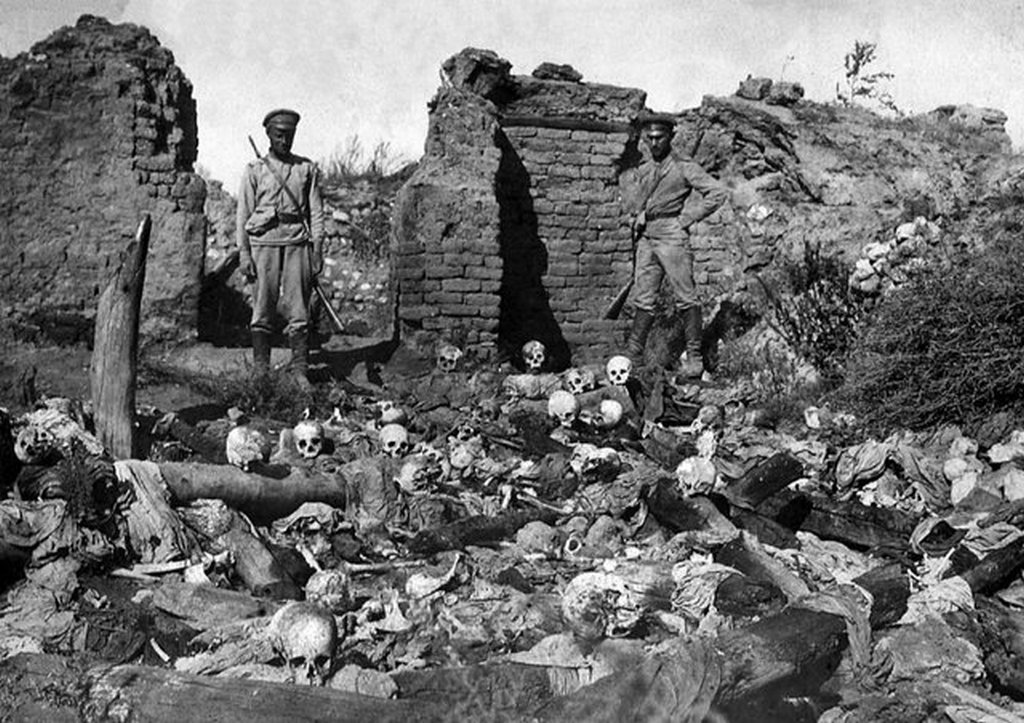 1915_adana_two_turkish_soldiers_in_front_of_massacred_armenian_civilians_armenian_genocide.jpg