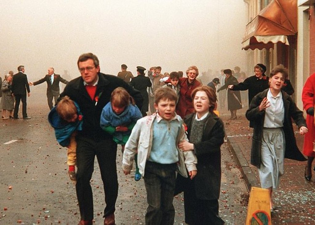 1987_townspeople_fleeing_the_remembrance_day_bombing_enniskillen_by_the_ira_of_a_civilian_church_parade_12_dead.jpg