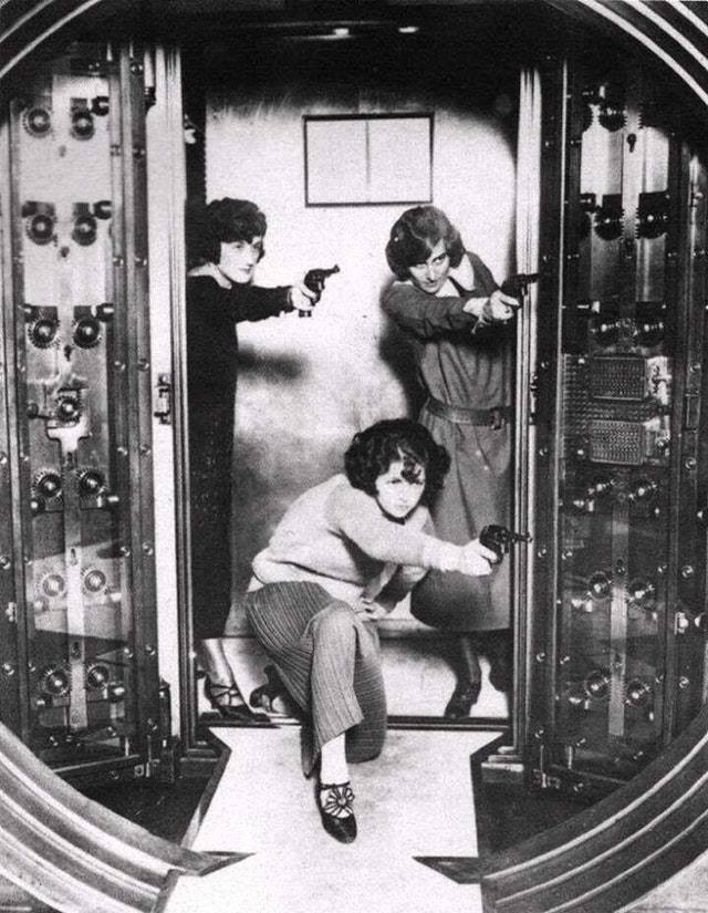 1924_three_employees_of_the_cleveland_trust_bank_co_being_trained_to_defend_the_bank_vault_in_the_company_s_office.jpg
