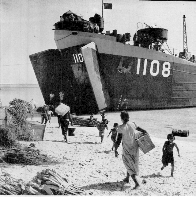 1946_marcius_the_residents_of_bikini_atoll_preparing_to_leave_their_island_to_allow_for_atomic_testing_they_had_been_told_they_could_return_sometime_after_testing_was_over.png