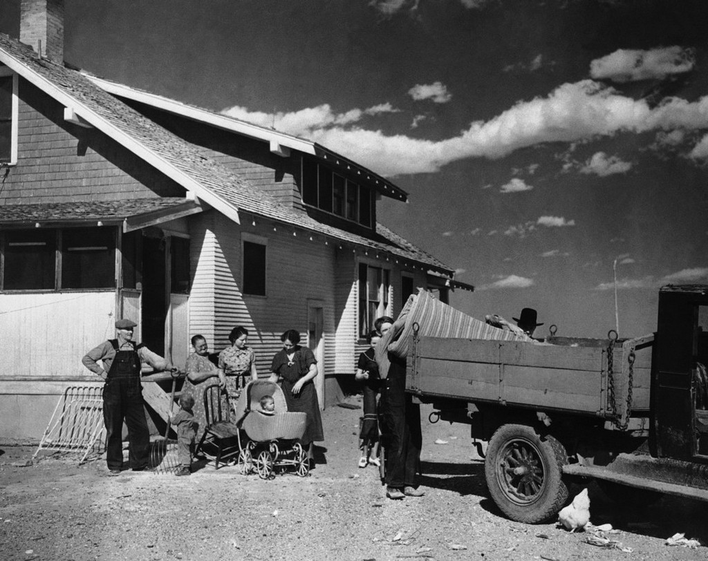 1937_from_ne_colorado_to_southwestern_colorado_irrigated_lands_more_than_100_families_will_be_moved_from_dust_bowl_lands_to_the_federal_project_hungarian_origin_kovach_family_load_household_goods_to_truck.jpeg