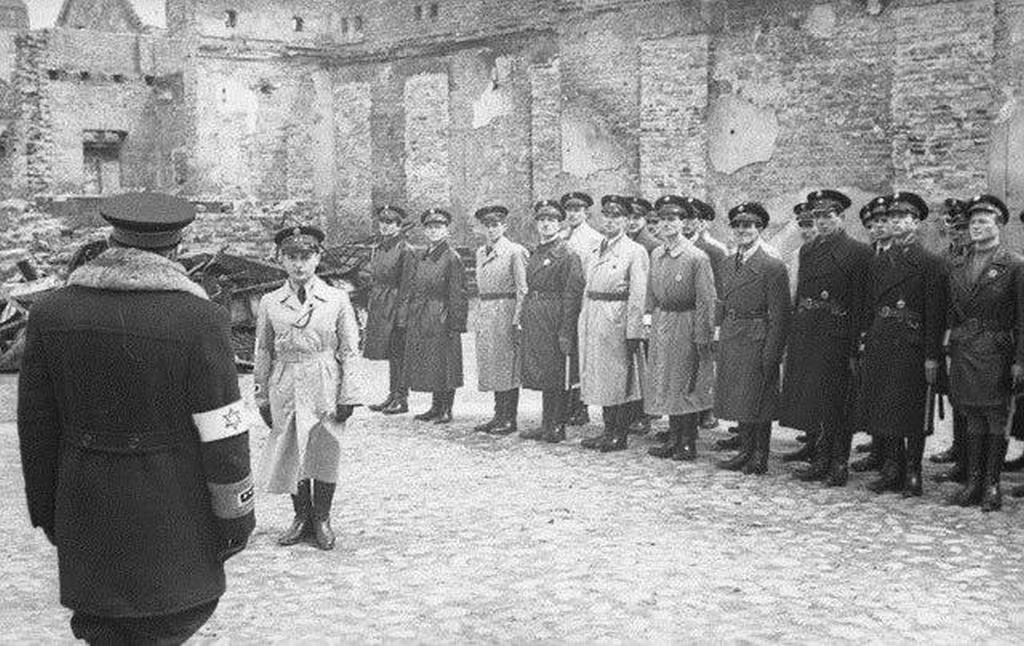 1941_members_of_the_all_jewish_warsaw_ghetto_police_line_up_inside_the_ghetto_for_inspection.jpg