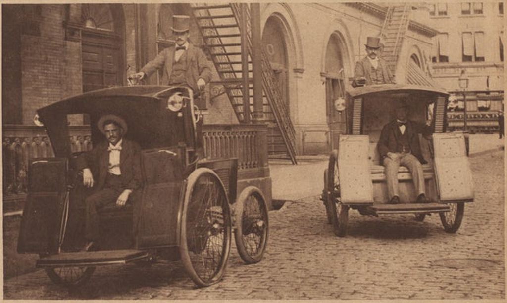 1898_morris_and_salom_electrobats_in_front_of_the_old_metropolitan_opera_house_on_manhattan_s_39th_street_the_electrobats_are_electric_battery-powered_cars_that_served_as_early_taxis_in_nyc.jpg