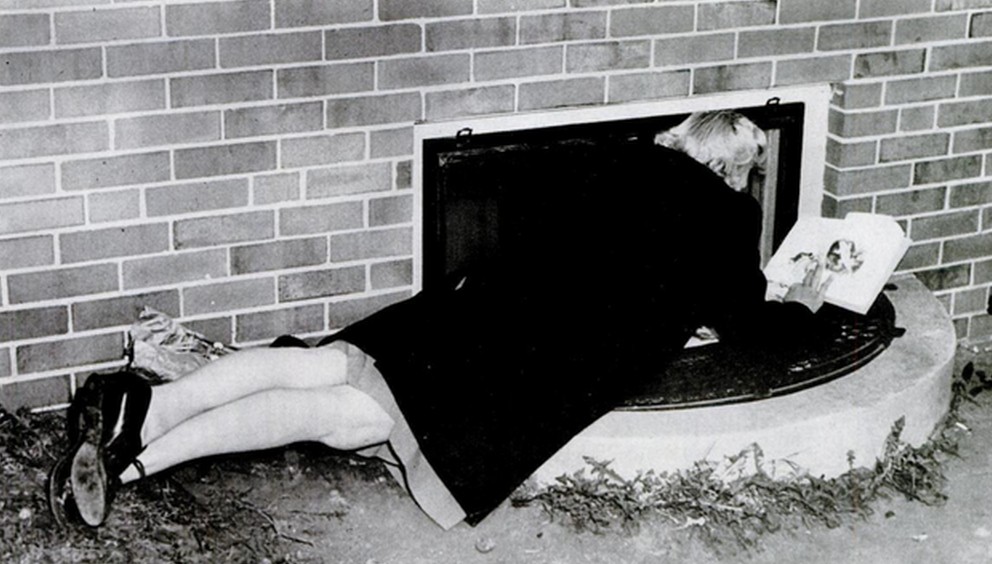 1949_a_mother_reads_to_her_6_year_old_child_through_a_basement_window_during_a_1949_polio_epidemic_quarantine_cr.jpg