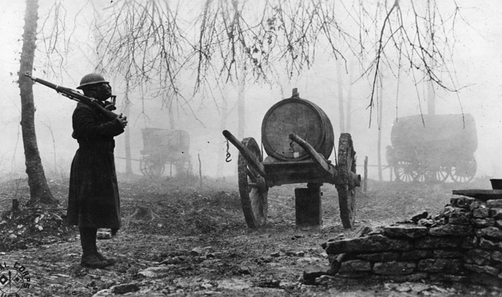 1918_an_american_soldier_stands_guard_during_a_german_gas_attack_in_france.png