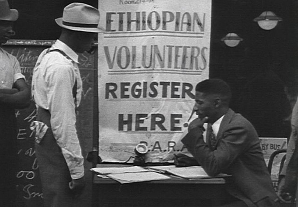 1935_crowds_register_in_harlem_to_defend_ethiopia_upon_hearing_that_africa_s_only_nation_not_conquered_by_european_powers_had_been_invaded_by_mussolini_black_americans_registered_blocked_by_gov.jpg