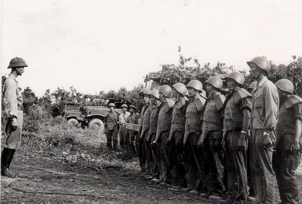 1965_nva_soldiers_wearing_east_german_uniforms_at_the_ho_chi_minh_trails_during_the_vietnam_war.jpg