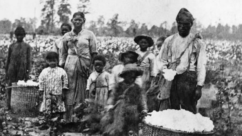 1860_slave_family_picking_cotton_in_the_fields_near_savannah.jpg