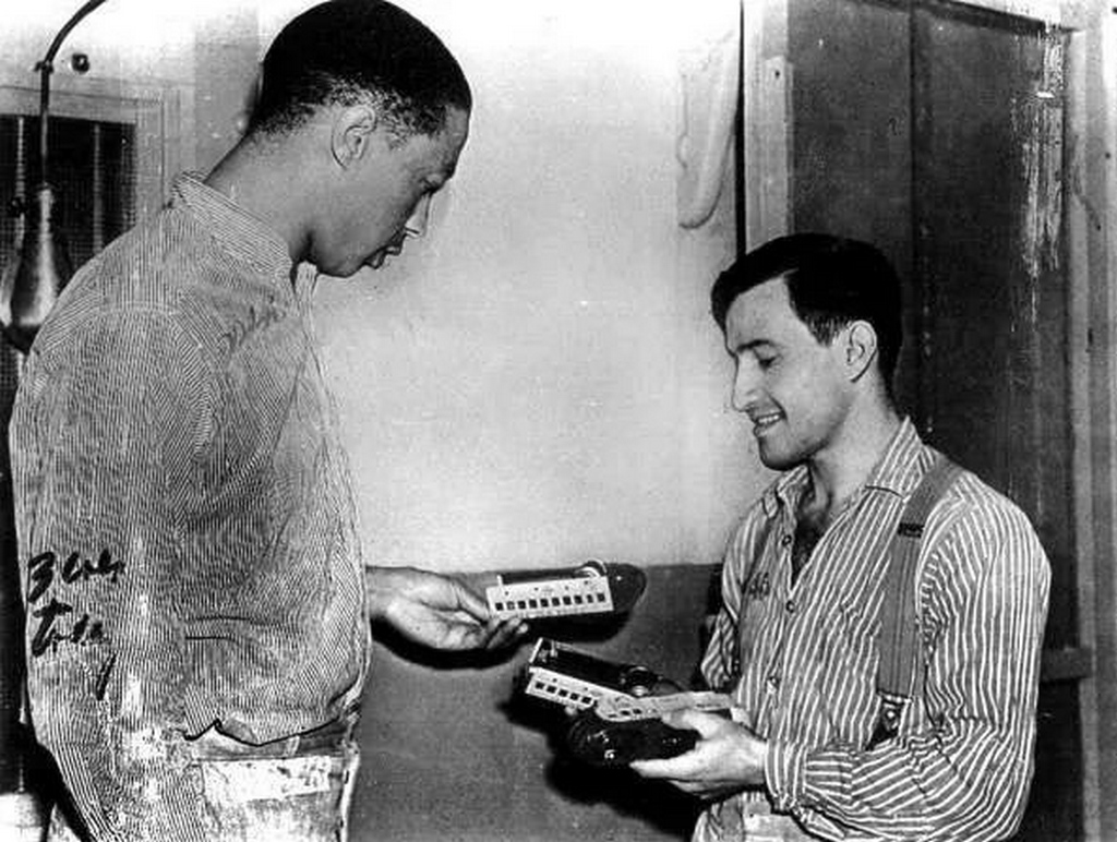 1939_joe_arridy_giving_his_toy_train_to_another_inmate_before_he_is_taken_to_the_gas_chamber.jpg