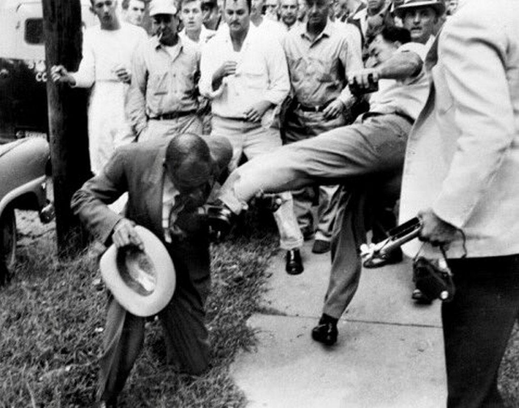 1957_l_alex_wilson_reporter_for_the_tri-state_defender_memphis_attacked_by_a_white_mob_near_central_high_school_little_rock_arkansas.jpg