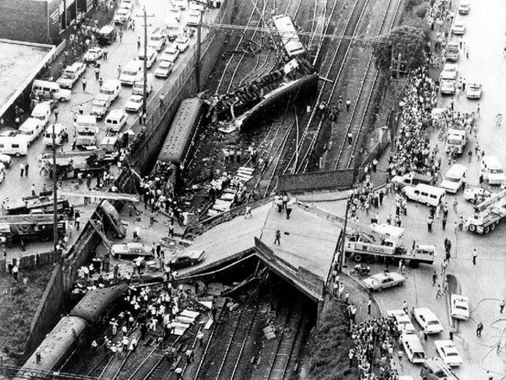 1977_granville_train_disaster_sydney_train_crashes_into_bridge_following_its_collapse_onto_2_of_the_carriages_83_deaths_and_213_injured.jpg
