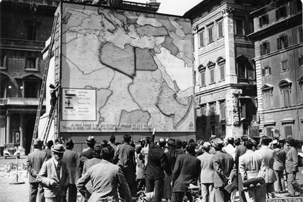 1941_italians_in_front_of_a_giant_map_of_north-eastern_africa_the_italian_empire_territories_are_in_high_relief_rome.jpg