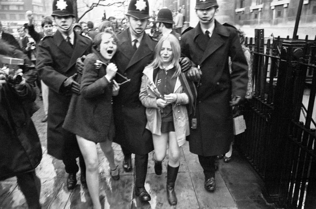 1969_upset_beatles_fans_crying_because_paul_mccartney_got_married_are_led_away_by_police.jpg