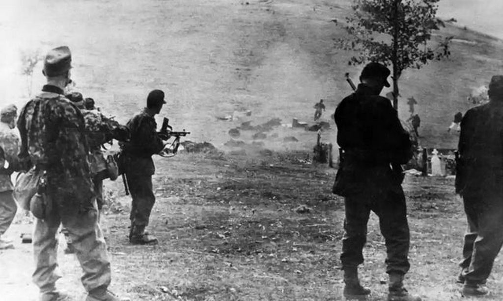 1942_german_soldiers_of_the_waffen_ss_use_fleeing_civilians_for_target_practice_serbia.jpg