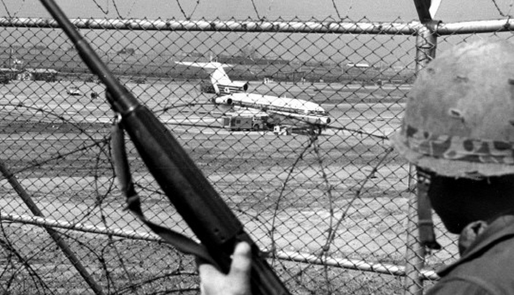 1970_south_korean_soldier_keeps_an_eye_on_japan_airlines_flight_351_which_was_hijacked_by_nine_members_of_the_japanese_red_army_faction_and_heading_for_north_korea.jpg