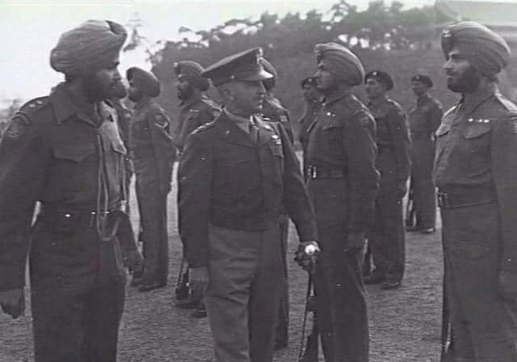 1947_major-general_chase_commander_1st_united_states_cavalry_division_inspects_the_gaurd_from_7th_indian_light_cavalry_at_the_imperial_plaza_tokyo_japan_cr.jpg