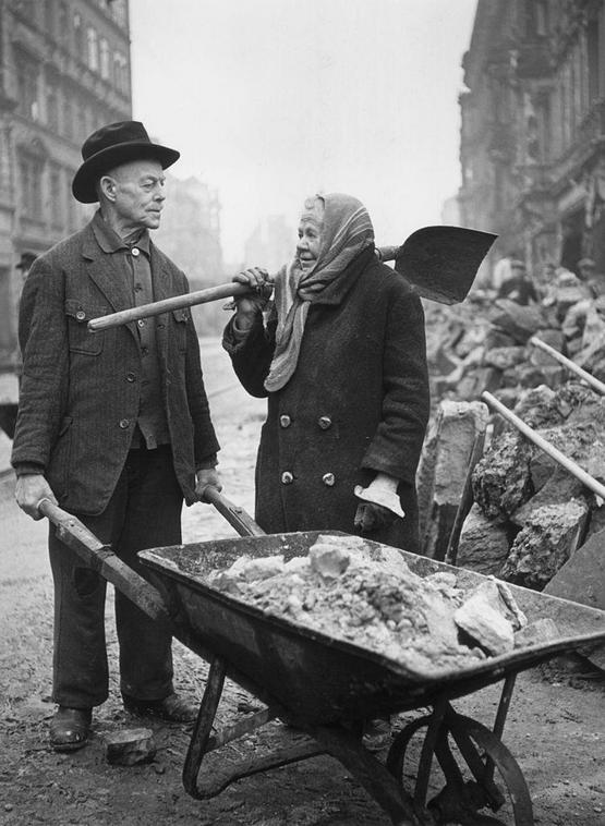 1946_an_elderly_couple_helping_to_clear_the_debris_during_the_post-war_reconstruction_of_bomb-damaged_dresden.jpg