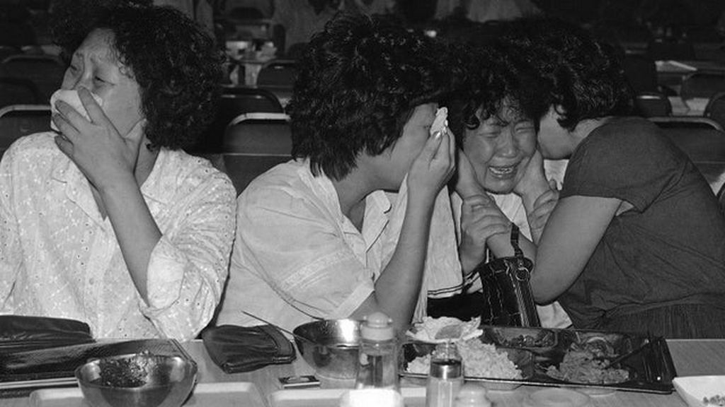 1983_family_of_a_passenger_onboard_korean_air_lines_flight_007_mourning_after_hearing_the_news_that_the_plane_was_shot_down_over_soviet_airspace_on_september_1st_with_no_survivors_among_its_269.jpg