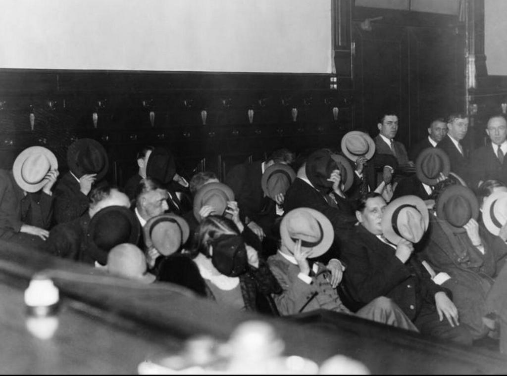 1931_mobsters_hide_their_faces_at_al_capone_s_trial.jpg