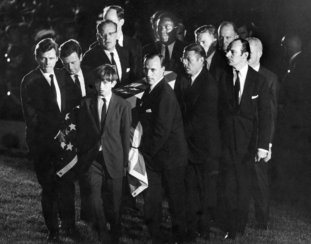 1968_joseph_p_kennedy_ii_eldest_son_of_senator_robert_f_kennedy_carries_the_body_of_his_father_to_its_final_resting_place_arlington_virginia.jpg