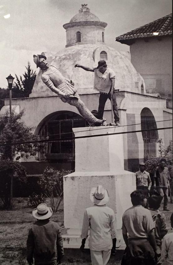 1992_a_indigenous_man_topples_a_statue_of_spanish_conquistador_diego_de_mazariegos_on_the_500th_year_anniversary_of_the_discovery_of_the_americas_chiapas_mexico.jpg