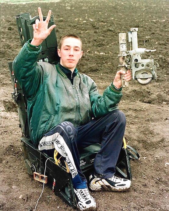 1999_serbian_civilian_poses_in_the_ejection_seat_of_a_f-117_nighthawk_after_it_was_shot_down_near_budanovci.jpg