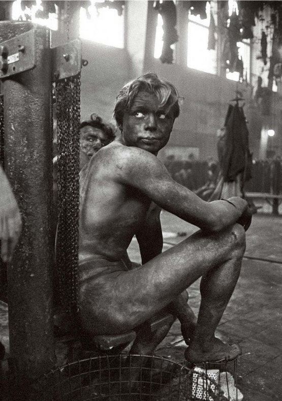 1958_coal_miner_waiting_to_get_into_the_communal_shower_at_the_end_of_his_shift_taken_in_gelsenkirchen_germany.jpg