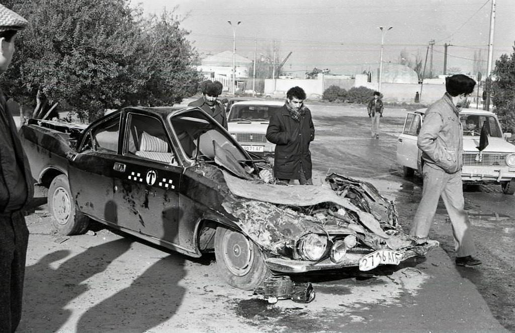 1990_a_cab_that_was_crushed_by_a_soviet_tank_in_baku.jpg