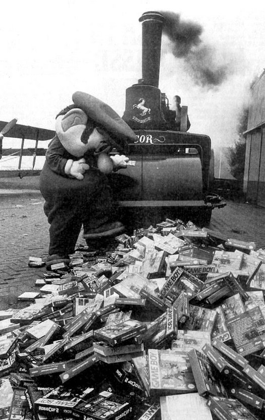 1994_netherlands_nintendo_used_a_crusher_to_destroy_illegal_game_boy_games_from_hong_kong_about_10_000_games_were_bulldozed_at_lelystad_airport_cr.jpg