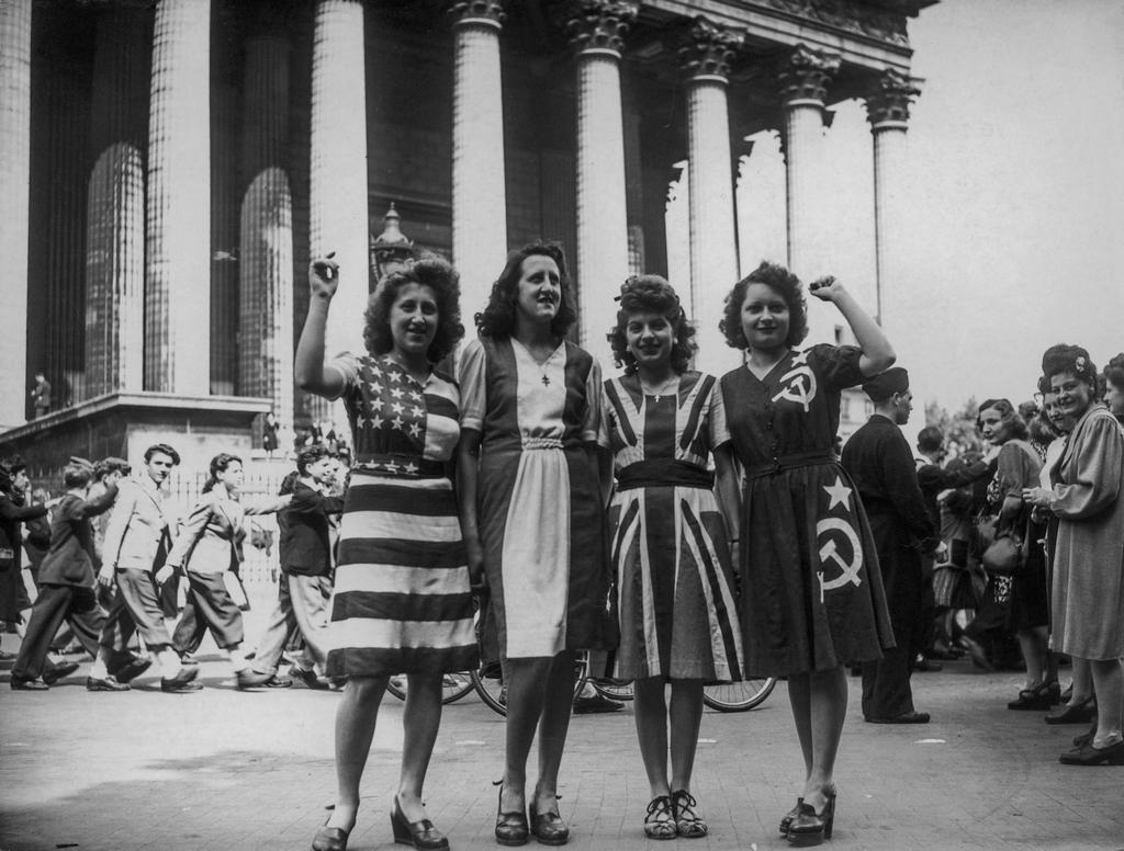 1945_parisian_women_dressed_in_the_flags_of_the_allies_on_the_place_de_la_madeleine_during_ve_day.jpg