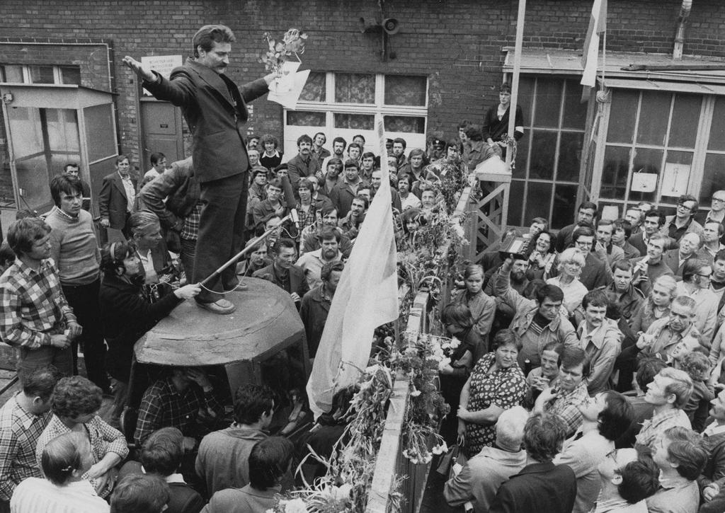 1980_labour_activist_lech_wa_sa_standing_on_a_makeshift_podium_as_he_addresses_striking_workers_at_the_lenin_shipyards_in_gda_sk_poland.jpg