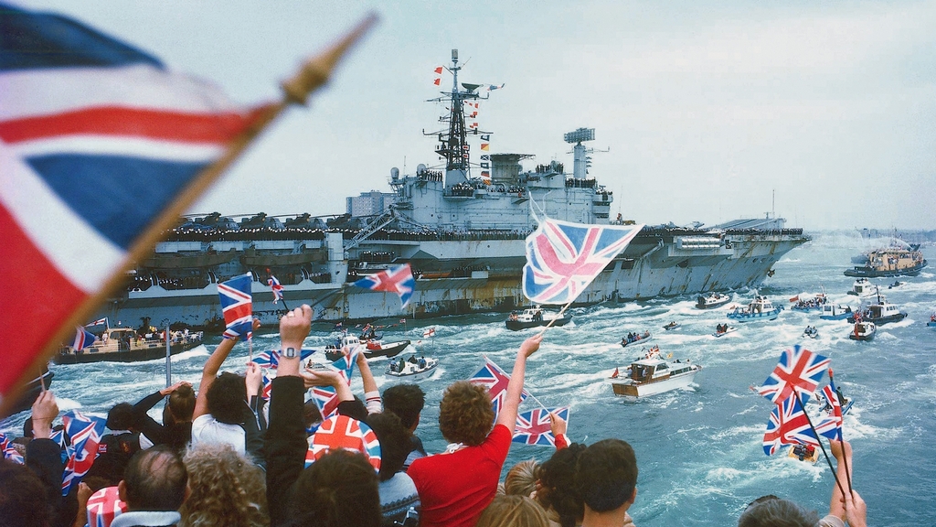 1982_hms_hermes_is_greeted_with_cheers_upon_her_return_home_from_the_falklands_war.jpg