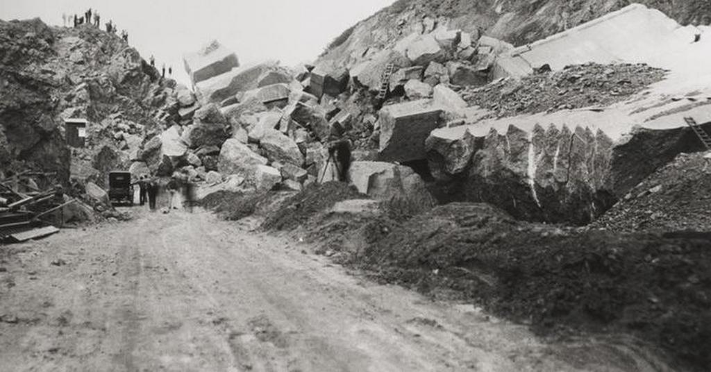 1928_a_group_of_people_and_their_car_stand_dwarfed_by_the_shattered_remains_of_the_st_francis_dam_la.jpg