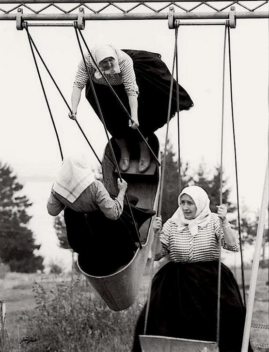 1967_three_old_ladies_swing_into_spring_czechoslovakia.jpg