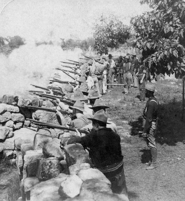 1899_us_soldiers_exchanging_fire_with_filipino_rebels_outside_taquig_philippines.jpg