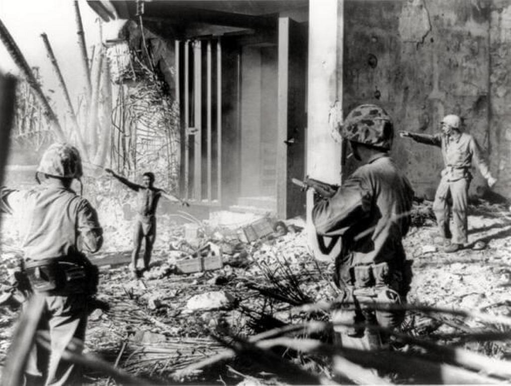 1944_a_japanese_soldier_surrendering_to_three_us_marines_in_the_marshall_islands.jpg