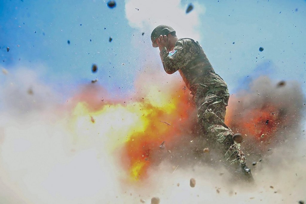 2013_american_war_photographer_hilda_clayton_captured_this_explosion_just_before_it_killed_her_3_colleagues_in_afg.jpg