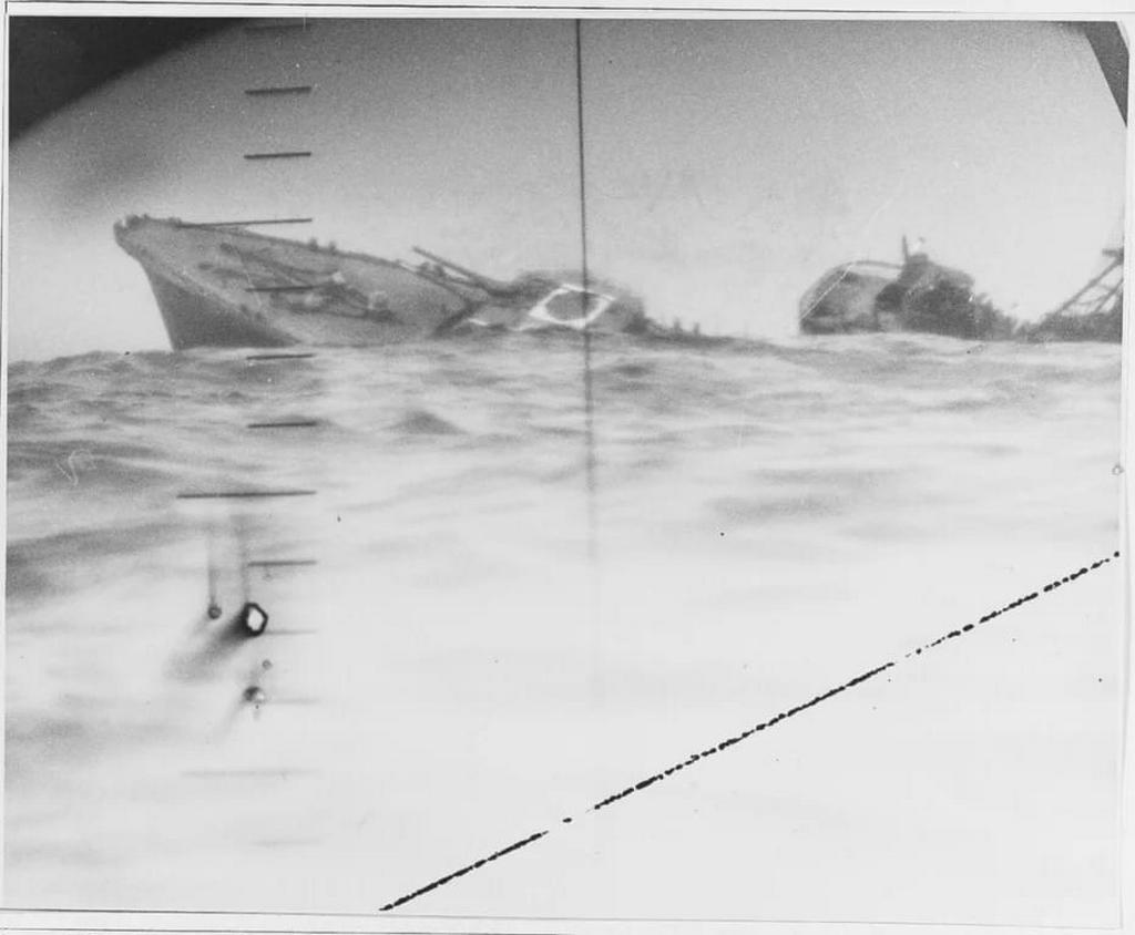 1942_a_sinking_japanese_destroyer_seen_through_the_periscope_of_the_uss_nautilus_submarine_cruiser.jpg