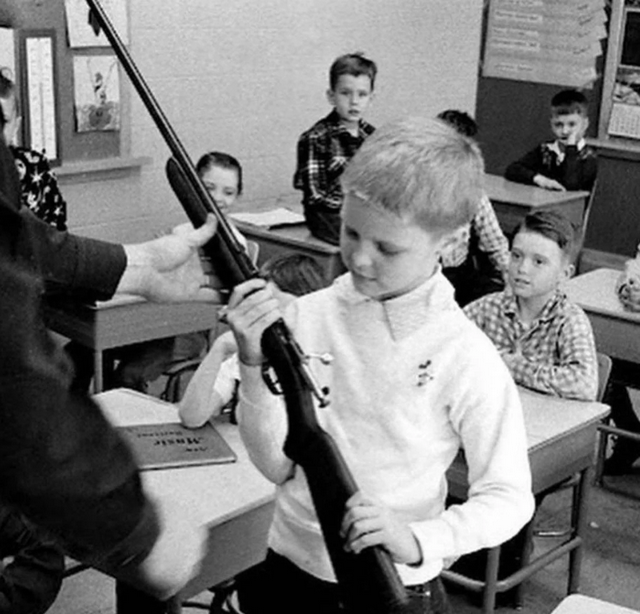1956_kids_being_taught_gun_safety_at_an_indiana_school.bmp