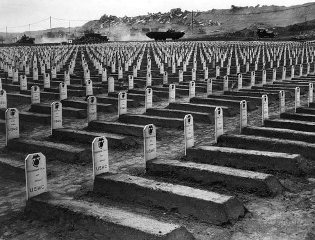 1945_iwo_jima_japan_us_army_cemetery_and_its_endless_rows_of_graves_and_once_held_the_remains_of_almost_7_000_u_s_sailors_and_marines.jpg